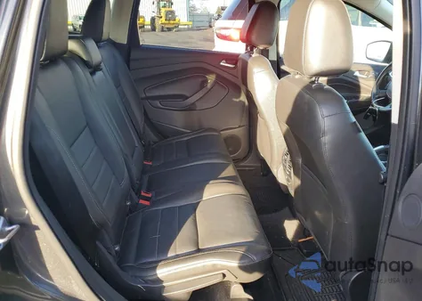 2015 Ford Escape Titanium z USA, uszkodzony, nr VIN 1FMCU9J98FUB06549